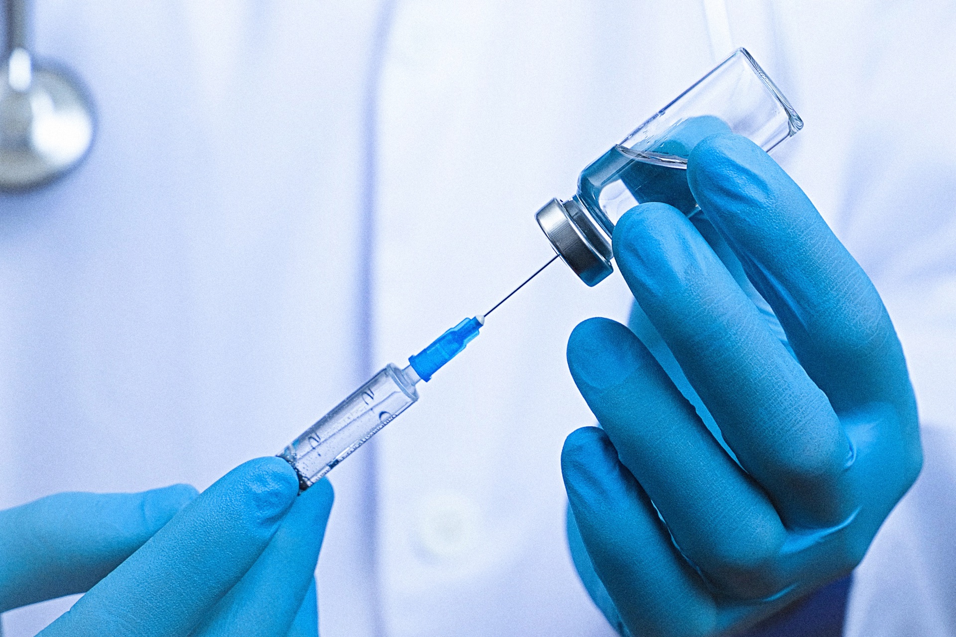 Vaccine vial and syringe